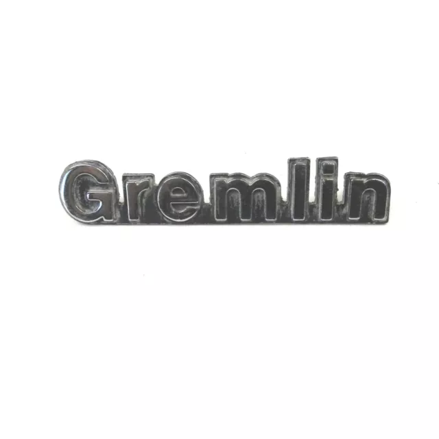 1974-78 Amc Gremlin #3672128 Rear Quarter Panel Emblem Badge Used Needs Cleaning