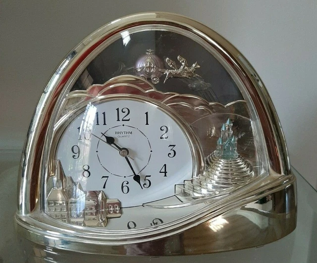 VINTAGE GOLD RHYTHM Quartz Cinderella Clock With Cinderella Rocking