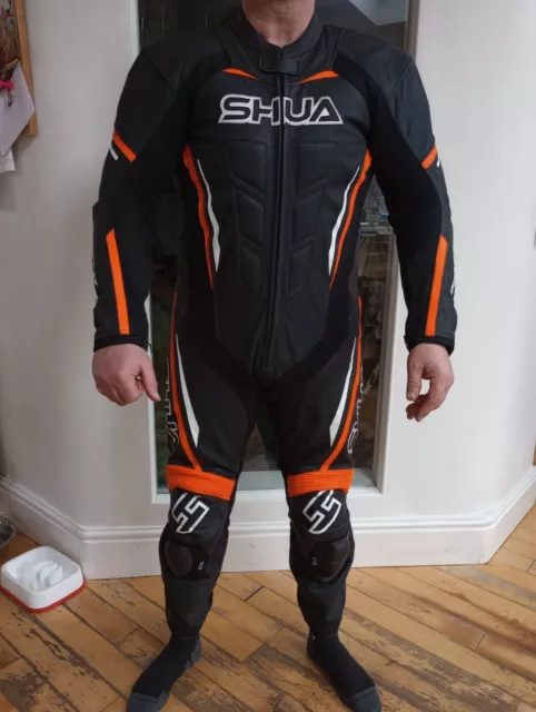 Shua  Men's Size 44" Chest 1 piece Motorcycle Black & Orange Racing Leathers