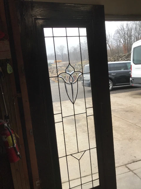 An 487 antique tulip Beveled glass entrance door 78.5 By 30 X 1 3-8”