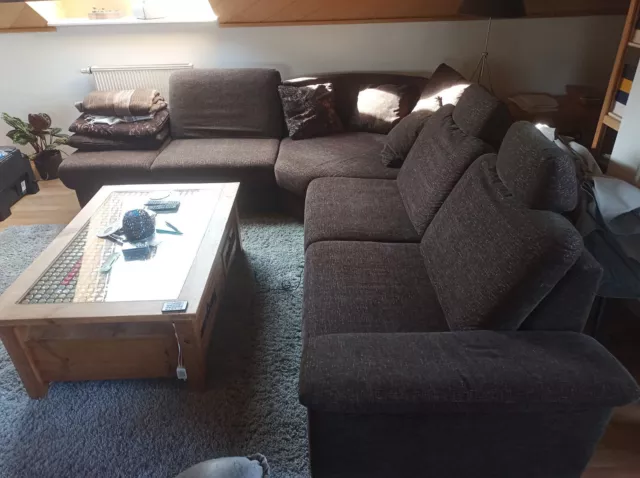 Großes Eck-Sofa mit rundem Eck und Hocker