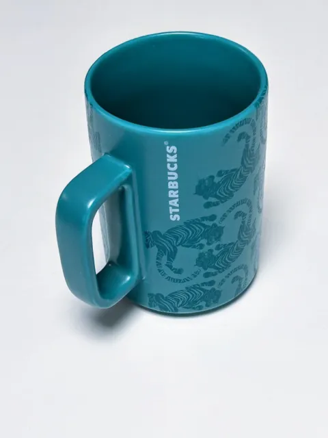 Starbucks Ceramic Handle Teal Blue Green Embossed Tiger 12 oz Mug Collectible