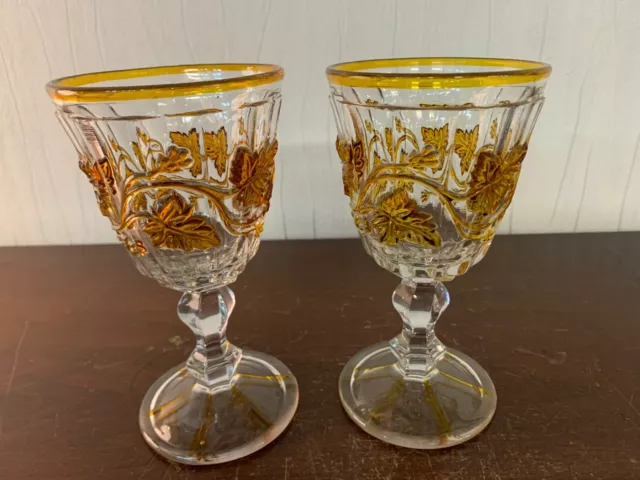 Lot de deux verres teinté oranger en cristal (prix des deux)