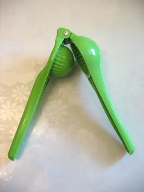 Prensa de plástico verde exprimido manual exprimidor de cal cítricos