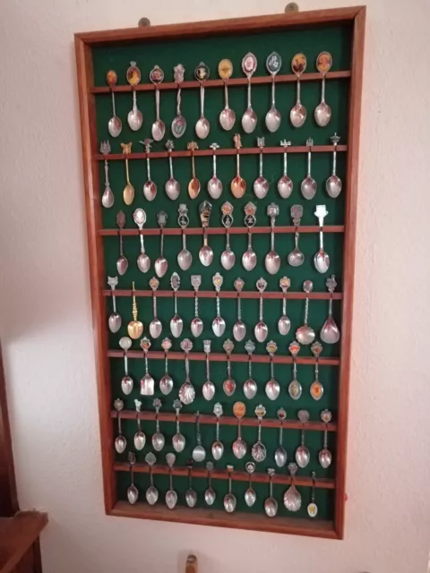 Huge Collection Of Souvenir And Commemorative Spoons On Wall Rack