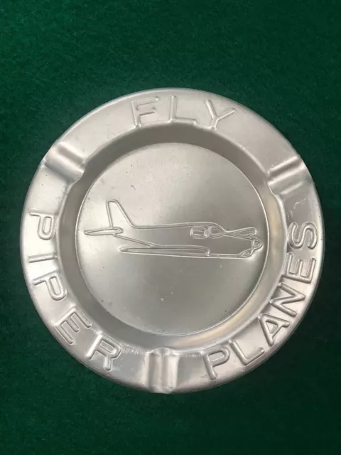 Cenicero publicitario de aluminio vintage ""aviones fly piper"" - nuevo