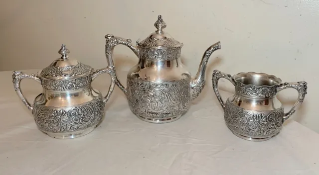 3 pc. antique ornate Victorian chased Pairpoint silverplate coffee tea pot set