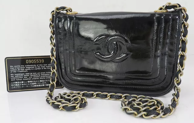 Chanel Black Lambskin & Patent Leather Camellia Flap Bag with, Lot #58001