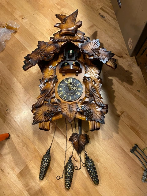 The Time Co Quartz Wood Battery Cuckoo Clock 25" not17" including weights x 17"