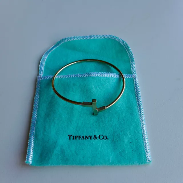 An original Tiffany & Co T Bangle Bracelet in 18k Yellow Gold