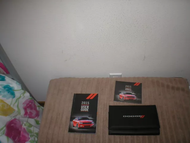 2015 Dodge Charger owners manual with cover case and DVD disc