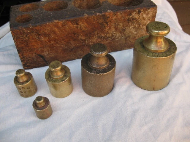 Set Of Five Antique Brass Merchant/Trade Weights.metric.some Marked 'Wr'.