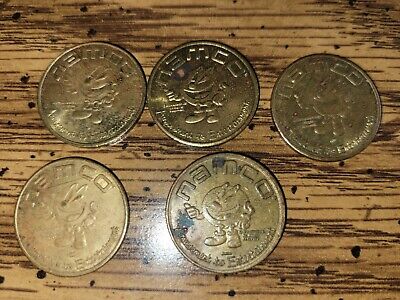 Lot of 7 Namco Arcade Tokens  Coins and Chuckie Cheese tokens