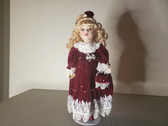 Porcelain Doll Limited Edition- 16" Red Velvet dress with Pearl/Lace; with stand