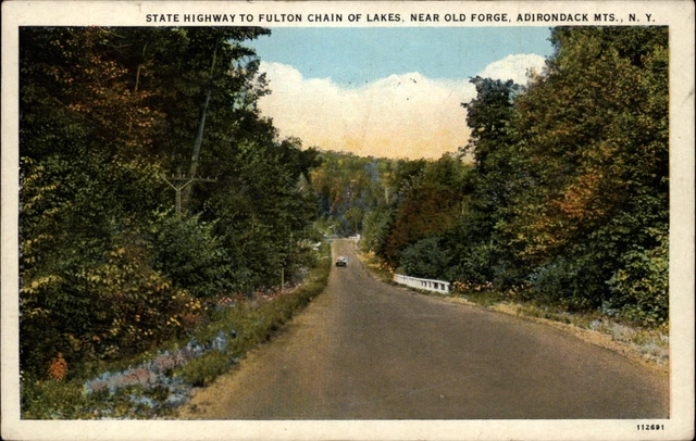 Old Forge New York Adirondack Mountains highway vintage postcard mailed 1931