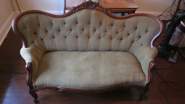 Antique loveseat couch