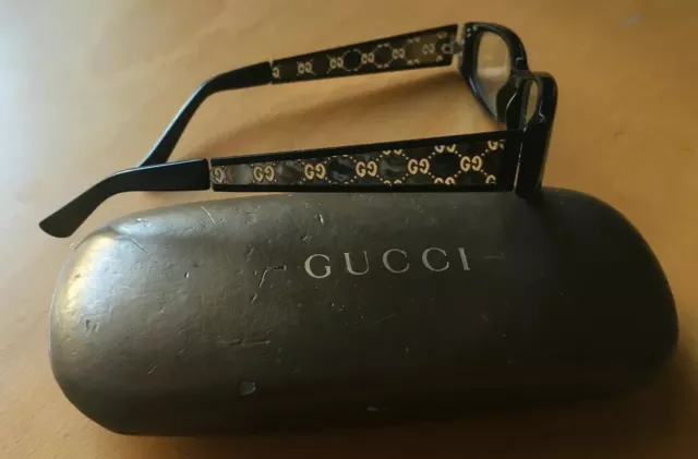 Occhiali da vista Gucci neri da donna rettangolari con aste logate traforate