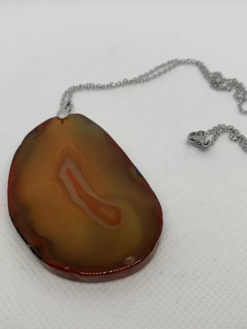 Polished Amber Agate Slice 6cms With A 50cm Silver Plated Chain.