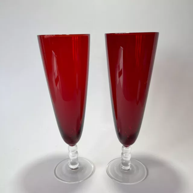 2 VINTAGE RED GLASS CHAMPAGNE FLUTES. CLEAR STEM. 1950’s. 250ml