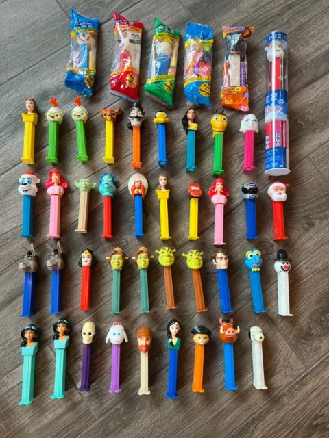 Pez dispensers collection, lot, 46 total Pez, some new.