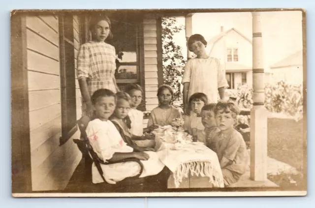 Children Tea Party Front Porch Portrait Early America Fashion RPPC Postcard 1910