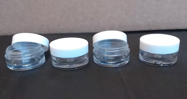 109 x 5ml clear jars with white cap.
