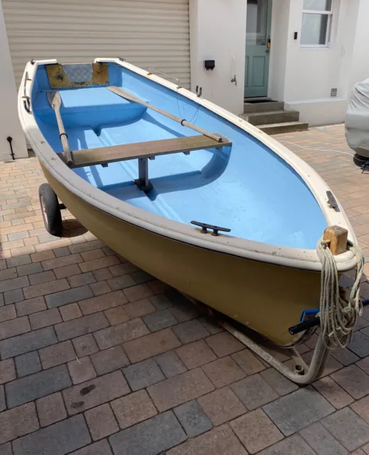 https://www.picclickimg.com/-zkAAOSwEwFhCBm9/12ft-Fibreglass-Dinghy-with-launch-trailer-and-oars.webp