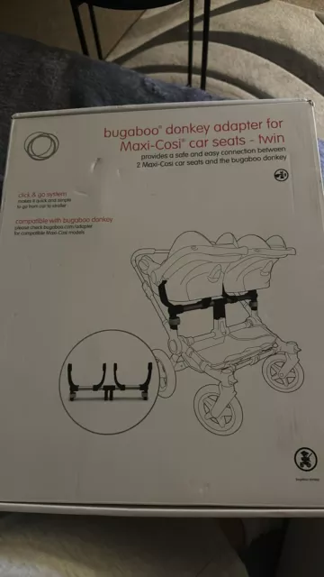 Bugaboo Donkey twin car seat adapter for maxi Cosi car seat.