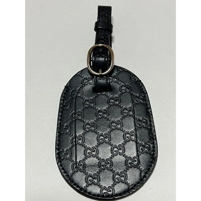 Luggage tag gucci deals