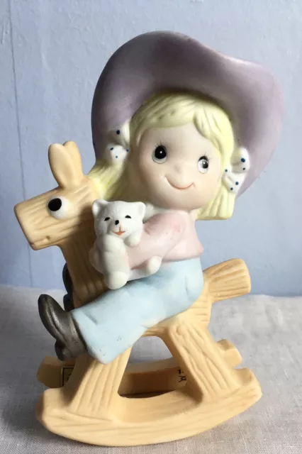 vintage porcelain Homco Cow girl with cat on rocking horse. #1417