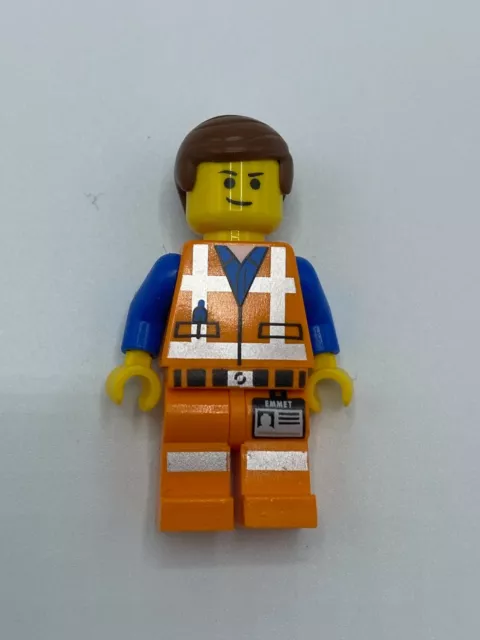 LEGO THE LEGO MOVIE MINIFIGURE tlm018 Emmet - Lopsided Closed Mouth Smile, NEW
