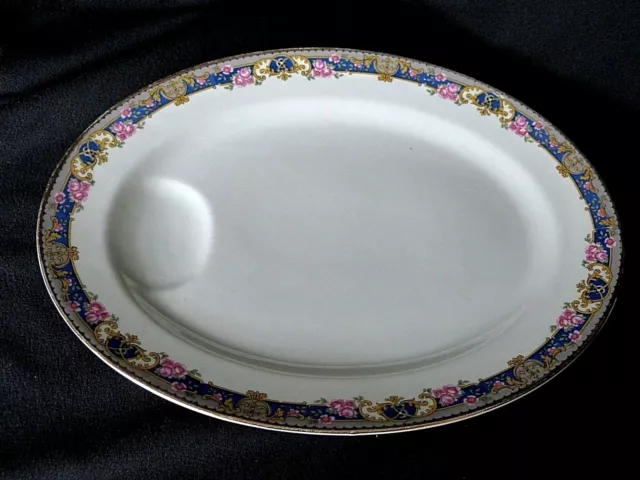 Grand plat ovale à viande en porcelaine de Limoges GDA