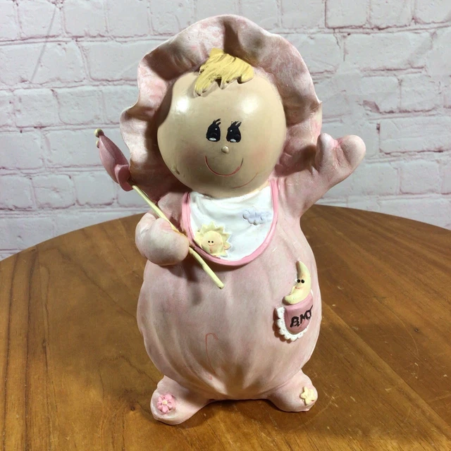 Cerdija de resina rosa para bebé niña con enchufe