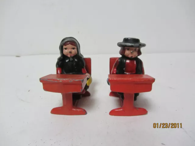 2 Vintage Painted Cast Metal Amish Boy And Girl In School Desks Figurine