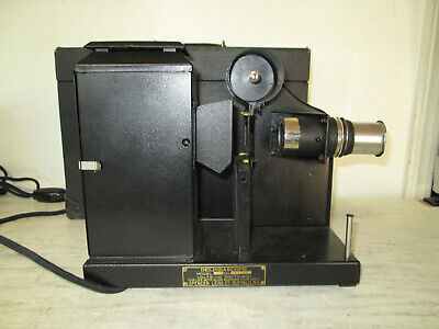 Vintage Delineascope Model M No. 6497 in Carrying Case and a lot of film strips