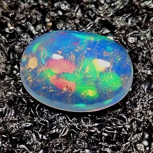 Natural Aaa Vvs Marvellous Color Play Oval Cabochon Ethiopian Opal 1.50 Cts