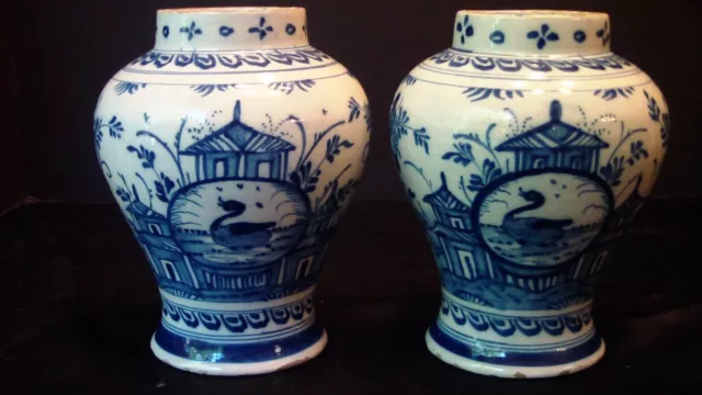 A Pair Of Dutch Delft Bulbous Vases