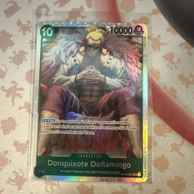 Carte One Piece Kingdoms Of Intrigue OP04-019 : Donquixote Doflamingo (Parallèle)