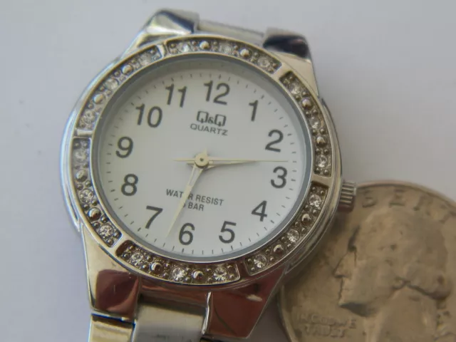 MONTRE QUARTZ DIAMANT R SISTANT L EAU QQ comme neuf QQ by