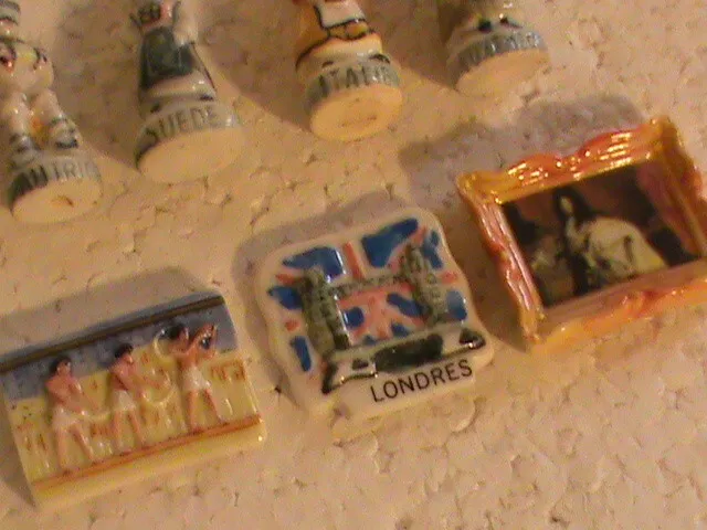 lot de 7 fèves porcelaine: PAYS/france:g b: egypte;autriche; italie;suede:luxemb 3