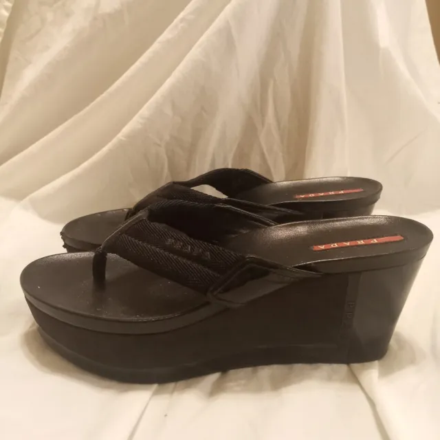 Prada Sport Black Canvas And Leather Wedge Flip Flops size 38.5 womens DAMAGED