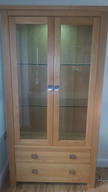 oak display cabinet with glass doors