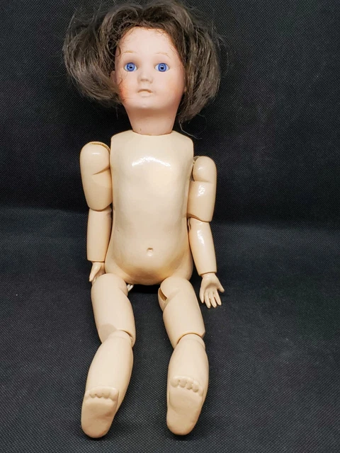 Ancienne poupée SFBJ PARIS 3 tête en porcelaine corps bois ? 38 cm