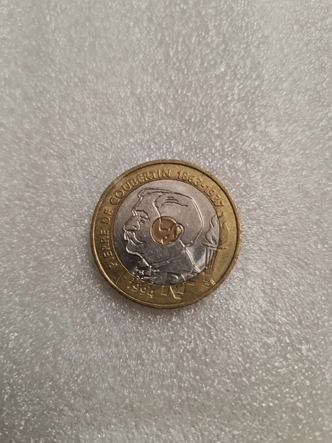 Festonneur à roulettes en caoutchouc dans sa boite d'époque