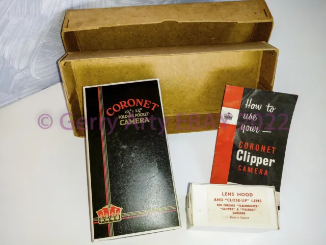 Cámara De Película Coronet Clipper Roll, Instrucciones, Lente De Suministro Y Embalaje Original