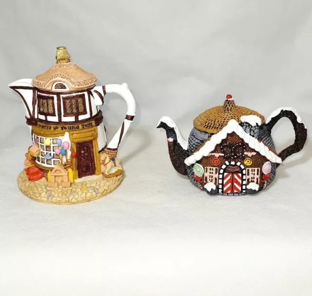 Set Of 2 Whimsical Hometown Cottages Teapots/ Merry Go Round Toys And Candy Shop