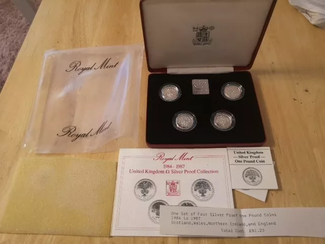 1984 - 1987 ROYAL MINT SILVER PROOF £1 COINS FOUR COIN SET - First £1 Designs