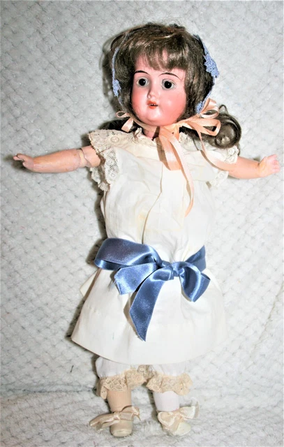 Poupée ancienne Limoges 9 Tête Porcelaine yeux marrons 57 cm