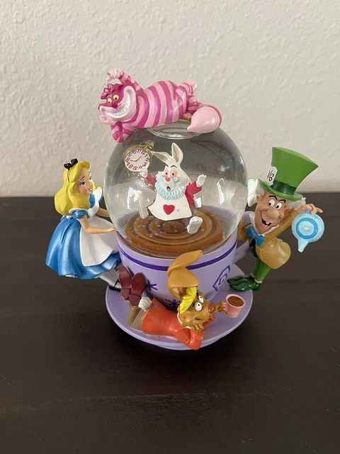 Alice In Wonderland Snow Globe Disney Park Exclusive Spinning Tea Cup Rare Alice In Wonderland Snow Globe Disney Park Exclusive Spinning Tea Cup Rare