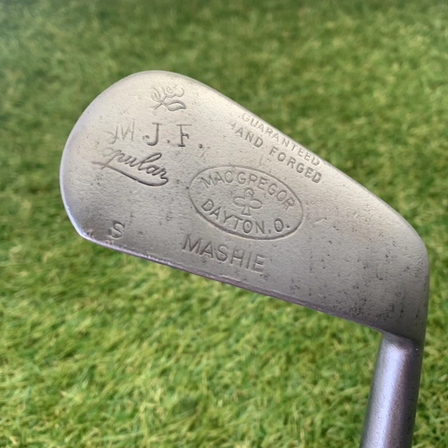 A collection of wooden shafted putters